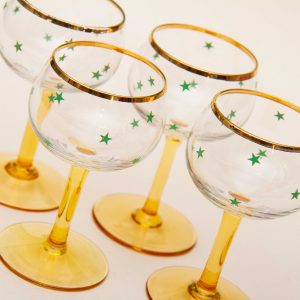 4 Amber Stemmed Cocktail Glasses With Gold Rims and Green Star Motif